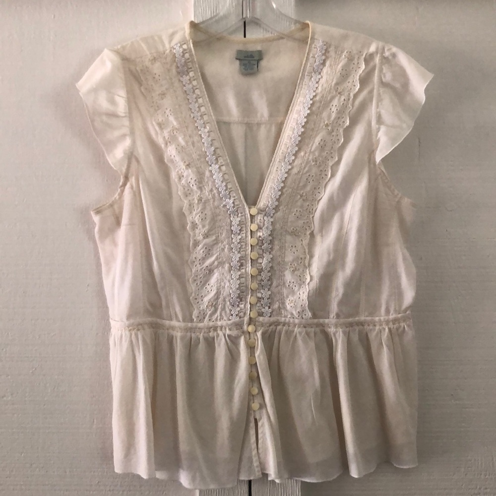 White shirt sleeve button up blouse.